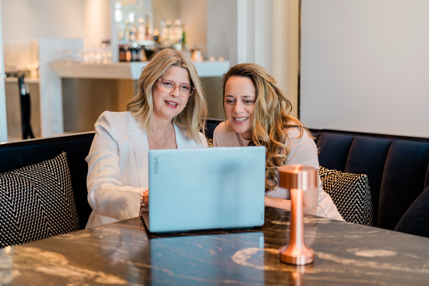 Lianne Grove working through the numbers with a client