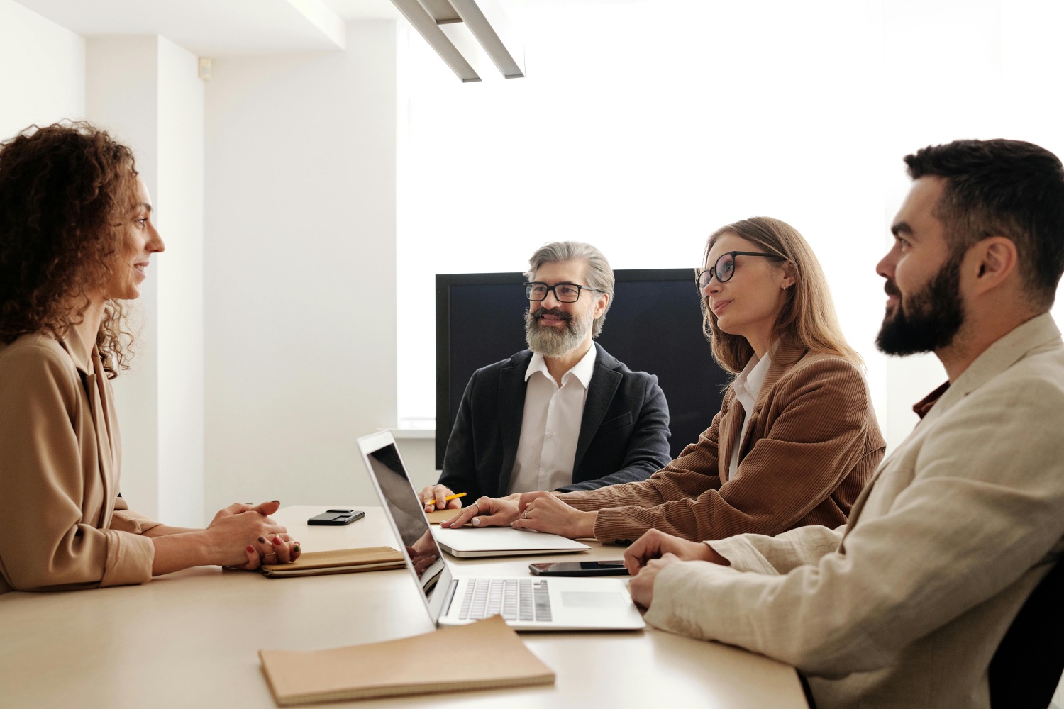 A service business leadership team in a financial review meeting